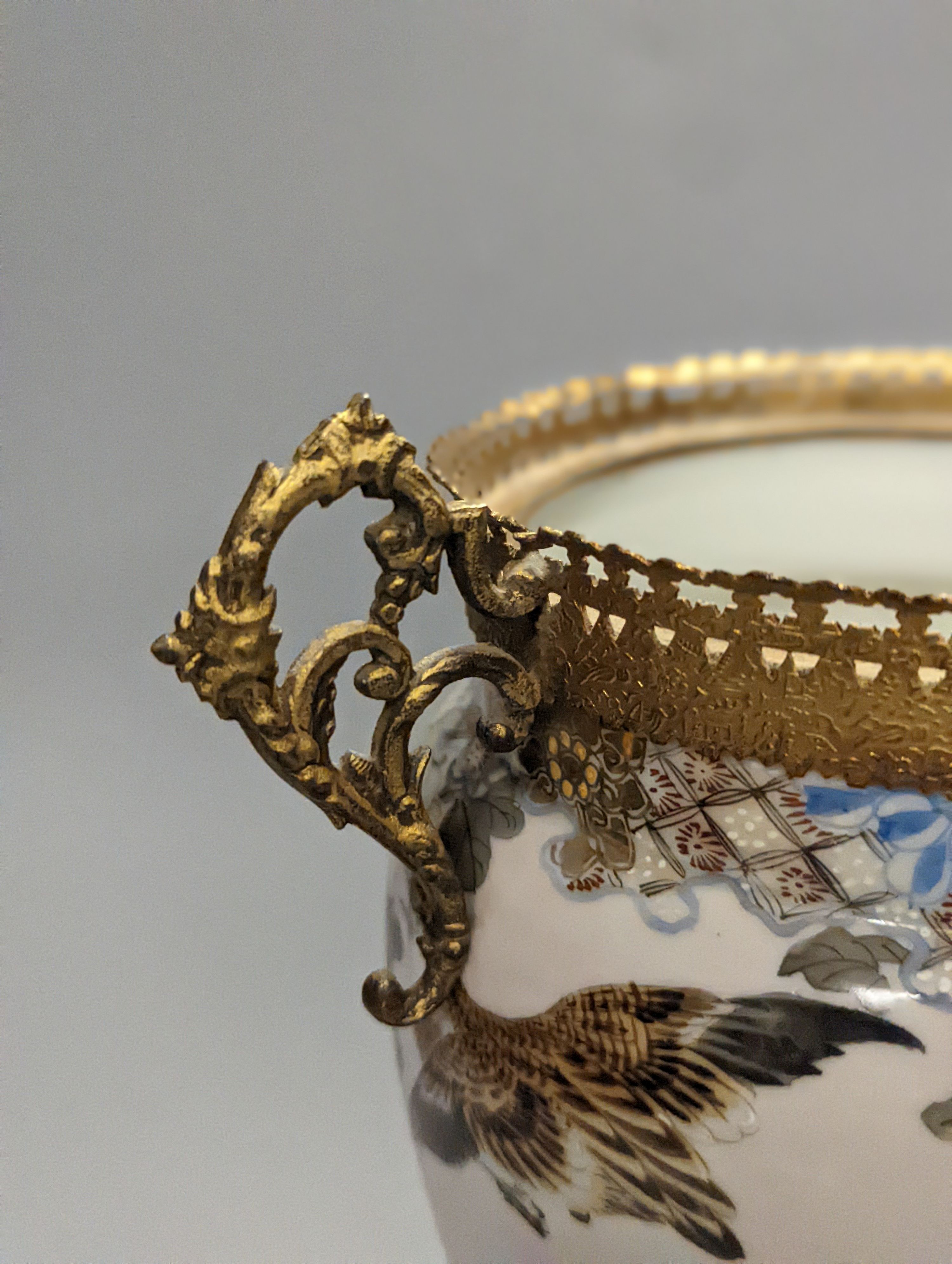 A Japanese porcelain ormolu mounted vase 27cm